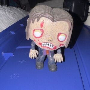 Funko Pop Zombie Vinyl Figure with Suit and Red Accents